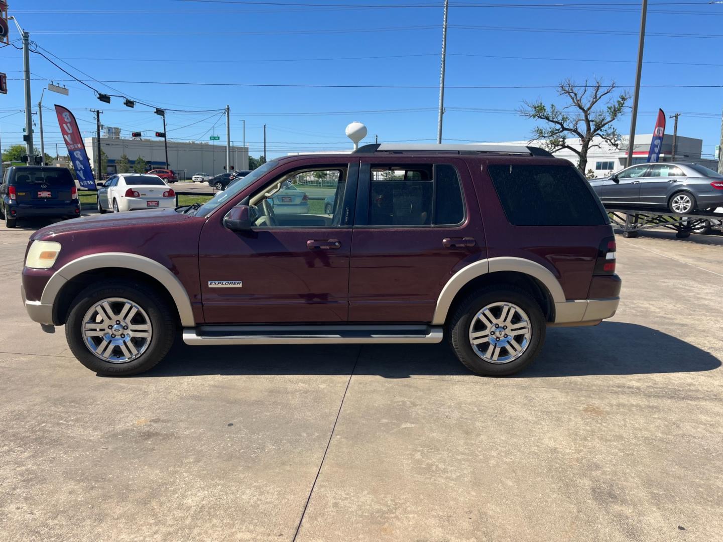 2006 maroom /TAN Ford Explorer Eddie Bauer 4.6L 4WD (1FMEU74816U) with an 4.6L V8 SOHC 16V engine, 6-Speed Automatic Overdrive transmission, located at 14700 Tomball Parkway 249, Houston, TX, 77086, (281) 444-2200, 29.928619, -95.504074 - Photo#3